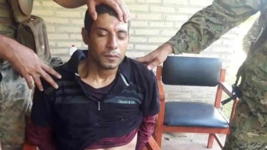 'Matrix' estava escondido na mata, a menos de dois quilômetros do local em que seu parceiro foi morto em confronto com os policiais Imagem: SNI/Secretaria Nacional de Inteligência do Paraguai 'Matrix' estava escondido na mata, a menos de dois quilômetros do local em que seu parceiro foi morto em confronto com os policiais Imagem: SNI/Secretaria Nacional de Inteligência do Paraguai